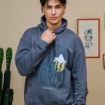 HEARTLESS IN A COLD WOLRD OVERSIZED HOODIE